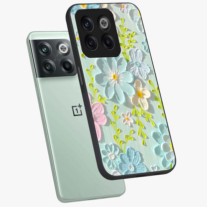 Frosted Petal Garden Glass Case for 1+10T angled mockup showcasing glossy finish and pastel bloom detailing