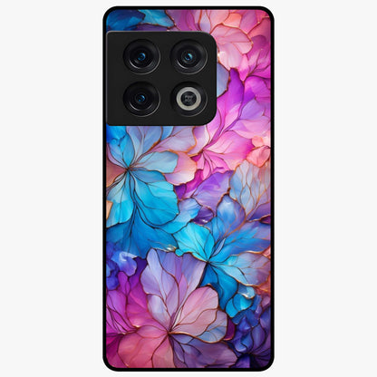 Radiant Floral Whirl Glass Case showing flat back view with swirling floral artwork and glossy glass finish.