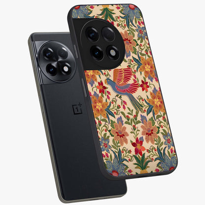 Tropical Folk Art Bird Glass Case for 1+11R angled mockup showcasing glossy finish and rich cultural tones