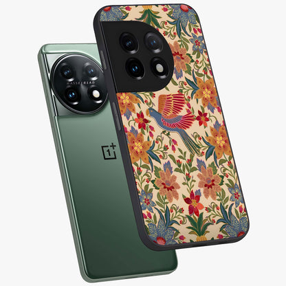 Tropical Folk Art Bird Glass Case for 1+11 angled mockup showcasing glossy finish and rich cultural tones