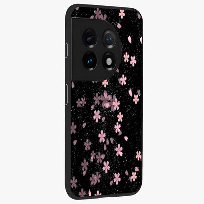 Pink Flower Black Background Glass Case for 1+11 side perspective highlighting vivid bloom textures and sleek build