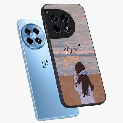 Girl Facing Sunset Beach Glass Case for 1+12R angled mockup showcasing glossy glass finish and warm beach tones