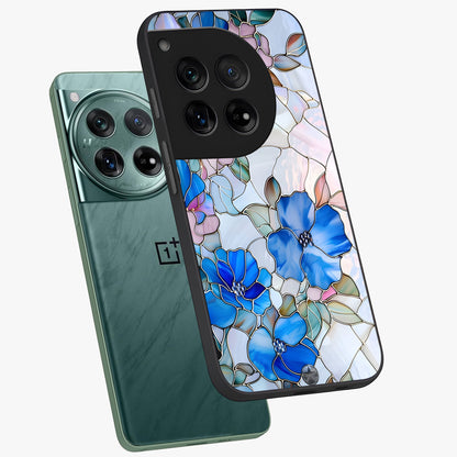 Stained Blue Floral Glass Case for 1+12 angled mockup showcasing glossy glass finish and rich sapphire tones