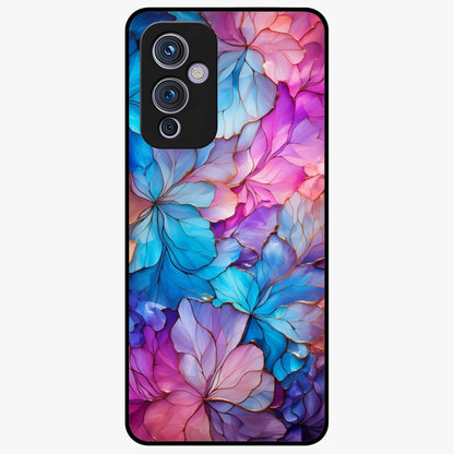 Radiant Floral Whirl Glass Case showing flat back view with swirling floral artwork and glossy glass finish.