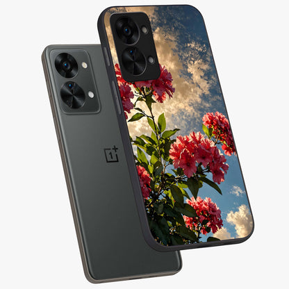 Moonlit Blossom Charm Glass Case for 1+Nord 2T angled mockup showcasing glossy glass finish and delicate bloom detailing