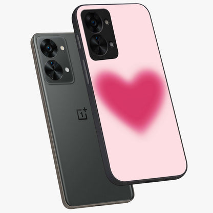 Pink Aura Heart Glass Case for 1+Nord 2T angled mockup showcasing glossy glass finish and radiant aura detailing