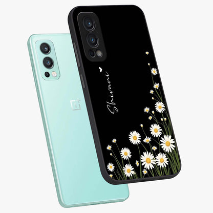 Daisy Cascade Custom Name Glass Case displayed in angled mockup highlighting delicate daisy artwork with custom name feature.