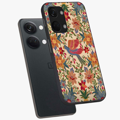 Tropical Folk Art Bird Glass Case for 1+Nord 3 angled mockup showcasing glossy finish and rich cultural tones