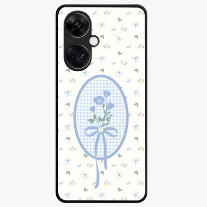 Blue Ribbon Bloom Glass Case for 1+Nord CE 3 elegant front view featuring soft floral artwork with ribbon accents