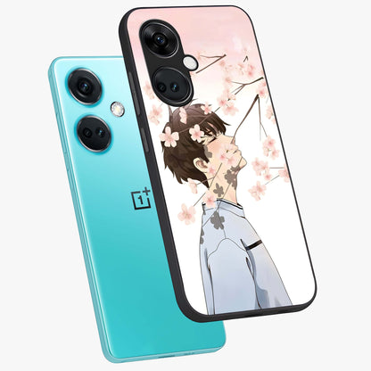 Pink Blossom Boy Glass Case for 1+Nord CE 3 angled mockup showcasing glossy finish and soft bloom tones