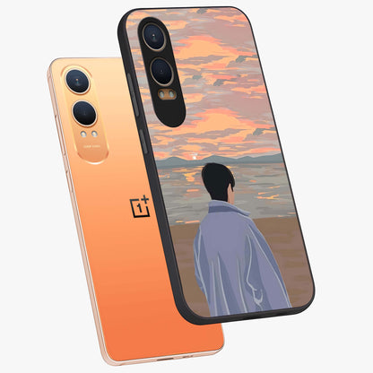 Boy Facing Sunset Beach Glass Case for 1+Nord CE 4 Lite angled mockup showcasing glossy finish and warm beach tones