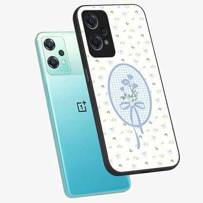 Blue Ribbon Bloom Glass Case for 1+Nord Ce 2 Lite angled mockup showcasing glossy finish and delicate bloom detailing