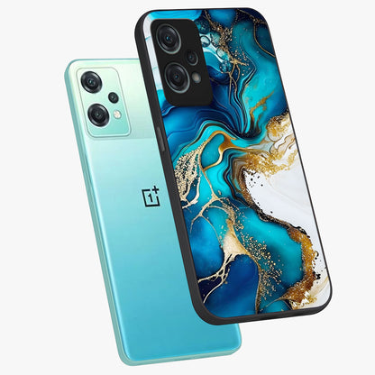 Blue and White Marble With Golden Viens Art Glass Case for 1+Nord Ce 2 Lite angled mockup showcasing glossy finish and premium marble pattern