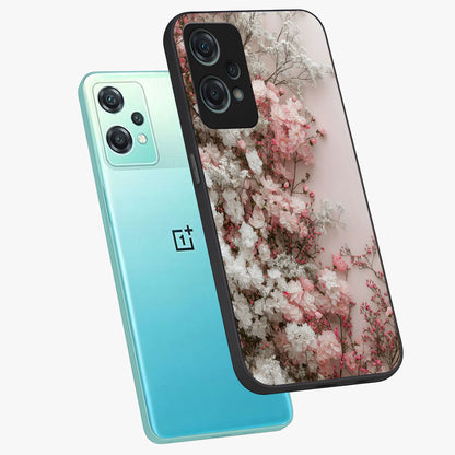 Blush Blossom Cloud Glass Case for 1+Nord Ce 2 Lite angled mockup showcasing glossy finish and pastel floral design