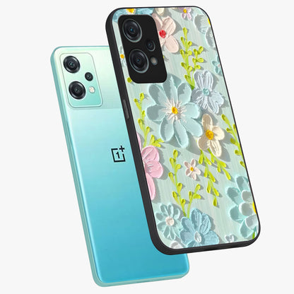 Frosted Petal Garden Glass Case for 1+Nord Ce 2 Lite angled mockup showcasing glossy finish and pastel bloom detailing