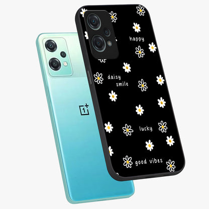 Good Vibes Daisy Black Pattern Glass Case for 1+Nord Ce 2 Lite angled mockup showcasing glossy finish and bold floral contrast