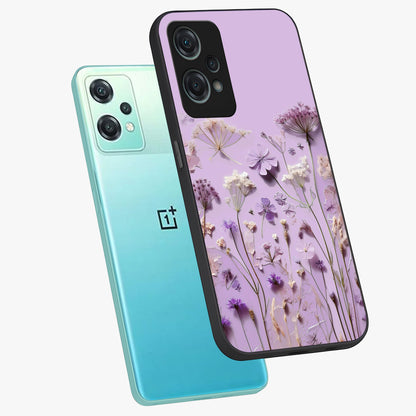Lavender Blossom Dream Glass Case for 1+Nord Ce 2 Lite angled mockup showcasing glossy finish and pastel purple tones