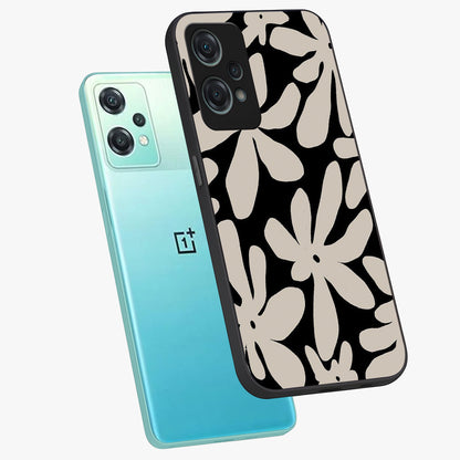 Monochrome Petal Dance Glass Case for 1+Nord Ce 2 Lite angled mockup showcasing glossy finish and elegant contrast detailing