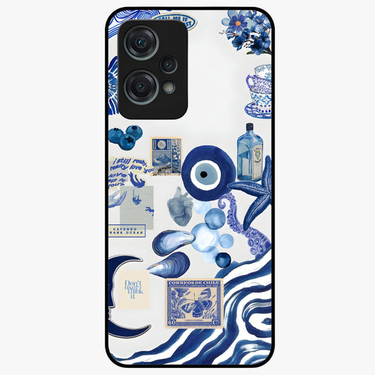 Evil Eyes Dark Blue Glass Case for 1+Nord Ce 2 Lite striking front view featuring deep blue evil eye artwork
