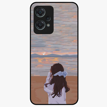 Girl Facing Sunset Beach Glass Case for 1+Nord Ce 2 Lite scenic front view featuring silhouette artwork against glowing sunset sky