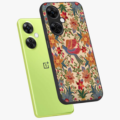 Tropical Folk Art Bird Glass Case for 1+Nord CE 3 Lite angled mockup showcasing glossy finish and rich cultural tones