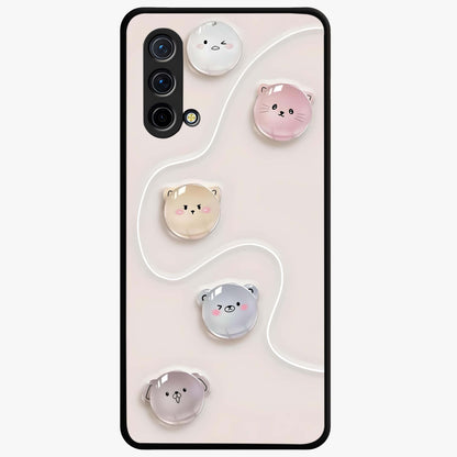 Puffy Face Parade Glass Case showing flat back view with cute puffy character faces artwork and glossy glass finish.