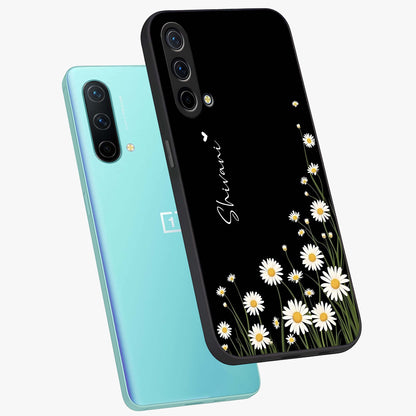 Daisy Cascade Custom Name Glass Case displayed in angled mockup highlighting delicate daisy artwork with custom name feature.