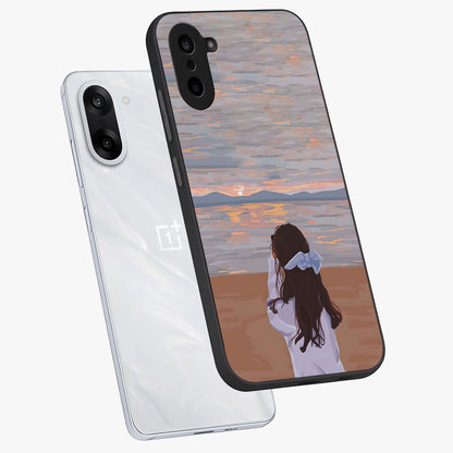 Girl Facing Sunset Beach Glass Case for 1+Nord CE 5 angled mockup showcasing glossy glass finish and warm beach tones