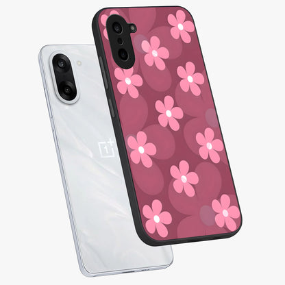 Pink Daisy Flower Pattern Glass Case for 1+Nord Ce 5 angled mockup showcasing glossy finish and playful bloom detailing