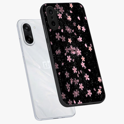 Pink Flower Black Background Glass Case for 1+Nord CE 5 angled mockup showcasing glossy finish and bold contrast tones