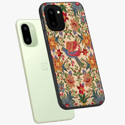 Tropical Folk Art Bird Glass Case for 1+15R angled mockup showcasing glossy finish and rich cultural tones