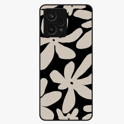 Monochrome Petal Dance Glass Case showing flat back view with monochrome floral artwork and glossy glass finish.