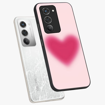 Pink Aura Heart Glass Case displayed in angled mockup highlighting vibrant pink heart design with dreamy aura aesthetic.