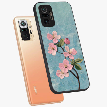 Threaded Blossom Breeze Glass Case displayed in angled mockup highlighting elegant floral design with soft aesthetic style.