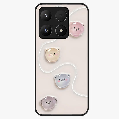 Puffy Face Parade Glass Case showing flat back view with cute puffy character faces artwork and glossy glass finish.