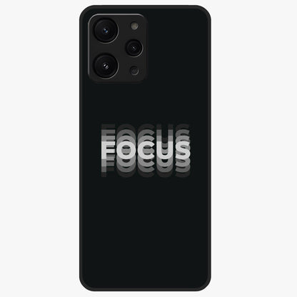 Focus Mode On Glass Case showing flat back view with bold motivational typography design and glossy glass finish.