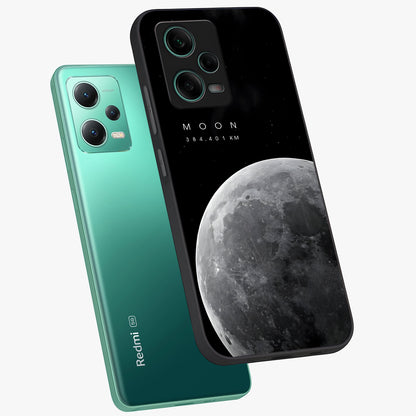 Cosmic Moon Glow Glass Case displayed in angled mockup highlighting celestial moon design with cosmic aesthetic theme.
