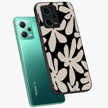Monochrome Petal Dance Glass Case displayed in angled mockup highlighting elegant petal design with black and white aesthetic.
