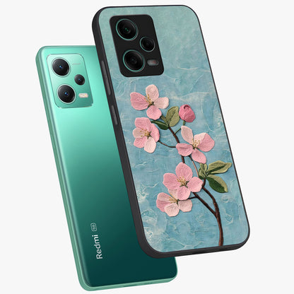 Threaded Blossom Breeze Glass Case displayed in angled mockup highlighting elegant floral design with soft aesthetic style.