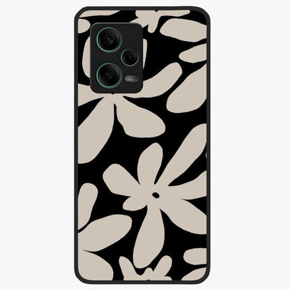 Monochrome Petal Dance Glass Case showing flat back view with monochrome floral artwork and glossy glass finish.