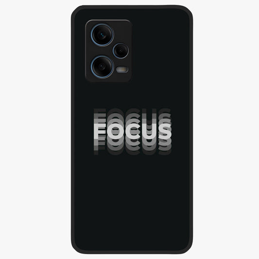 Focus Mode On Glass Case showing flat back view with bold motivational typography design and glossy glass finish.