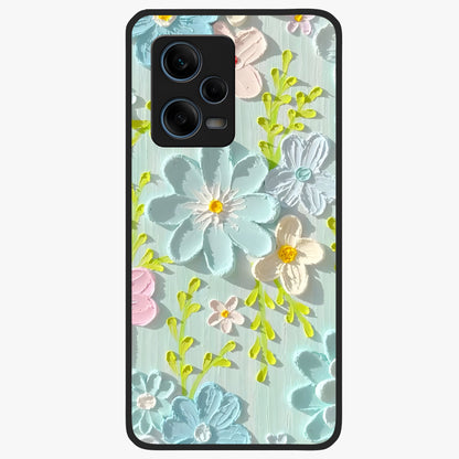 Frosted Petal Garden Glass Case showing flat back view with soft frosted floral artwork and glossy glass finish.
