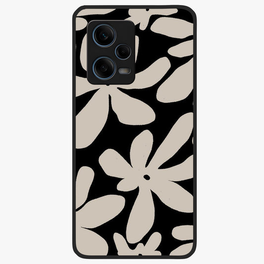 Monochrome Petal Dance Glass Case showing flat back view with monochrome floral artwork and glossy glass finish.