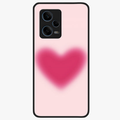 Pink Aura Heart Glass Case showing flat back view with glowing heart artwork and glossy glass finish.