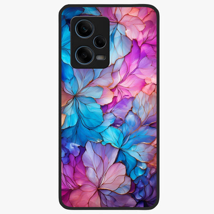 Radiant Floral Whirl Glass Case showing flat back view with swirling floral artwork and glossy glass finish.