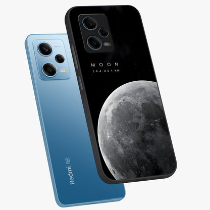 Cosmic Moon Glow Glass Case displayed in angled mockup highlighting celestial moon design with cosmic aesthetic theme.
