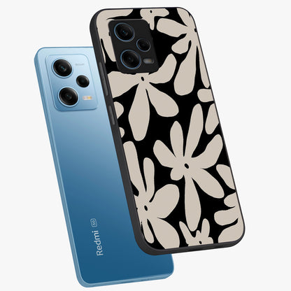 Monochrome Petal Dance Glass Case displayed in angled mockup highlighting elegant petal design with black and white aesthetic.