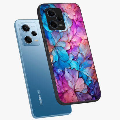 Radiant Floral Whirl Glass Case displayed in angled mockup highlighting vibrant flower pattern with dynamic artistic aesthetic.