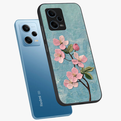 Threaded Blossom Breeze Glass Case displayed in angled mockup highlighting elegant floral design with soft aesthetic style.