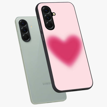 Pink Aura Heart Glass Case displayed in angled mockup highlighting vibrant pink heart design with dreamy aura aesthetic.